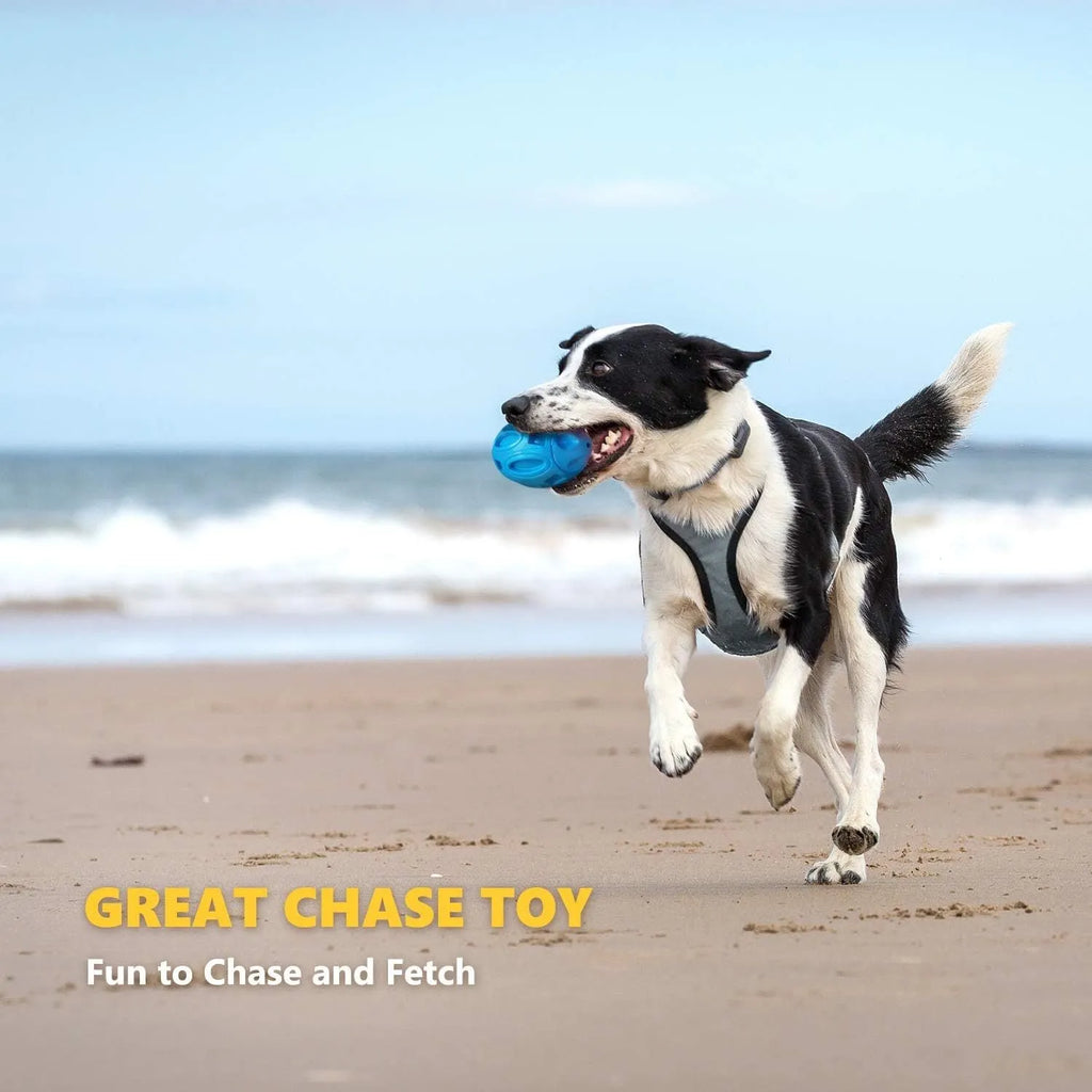 Blue, green, and orange squeaky rubber dog ball with surface grooves for aggressive chewers