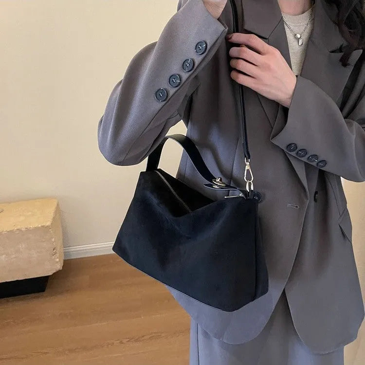Retro frosted suede underarm handbag in black, brown or coffee with single strap, lock and stitching details.