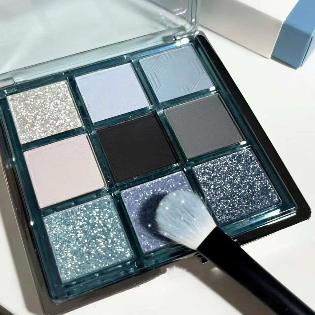 MUGELEEN nine-colour eye shadow palette in blue smoked and earth tones with matte shimmer finishes