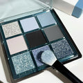 MUGELEEN nine-colour eye shadow palette in blue smoked and earth tones with matte shimmer finishes