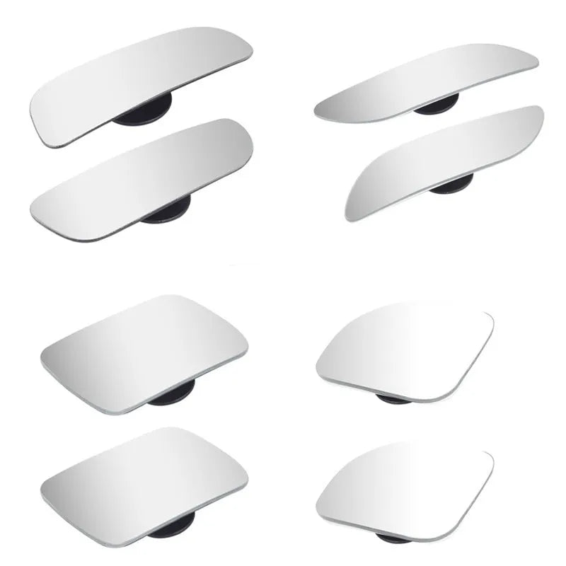 Glass adjustable blind spot mirror with angle bracket shown next to a vehicle rearview mirror.