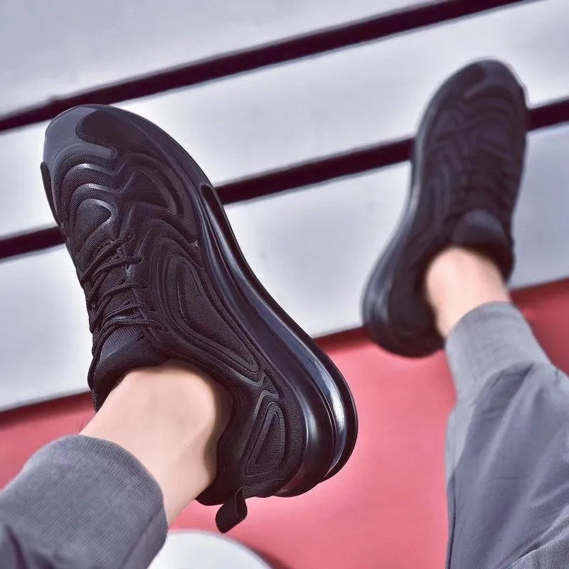 Men's black casual running shoes with a thick sole and lace-up front.