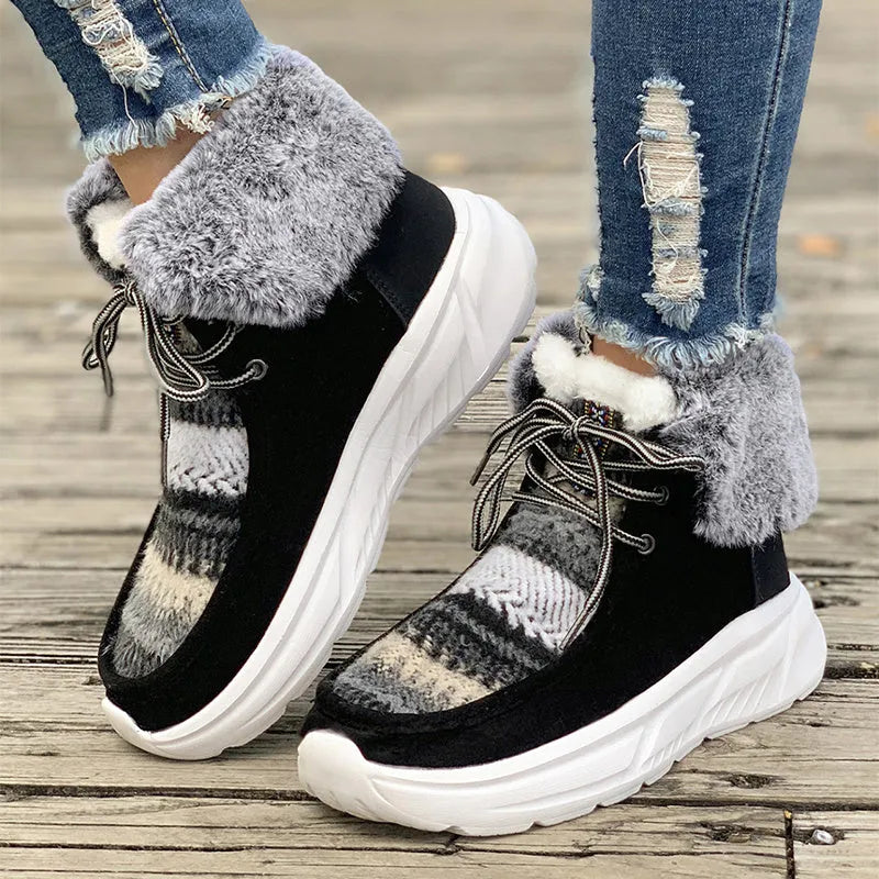 Women's beige suede lace-up snow boots with thick rubber soles and plush lining