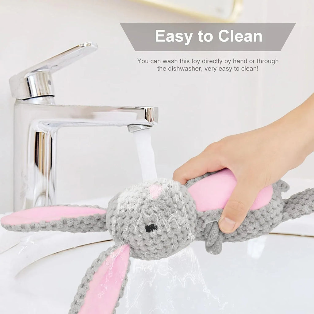 Multi-texture dog toy with plush animal design, cotton rope elements, and crinkle paper interior