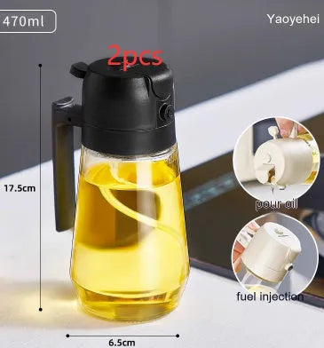 Glass olive oil sprayer bottle with ergonomic handle in beige, showing spray and pour functions.