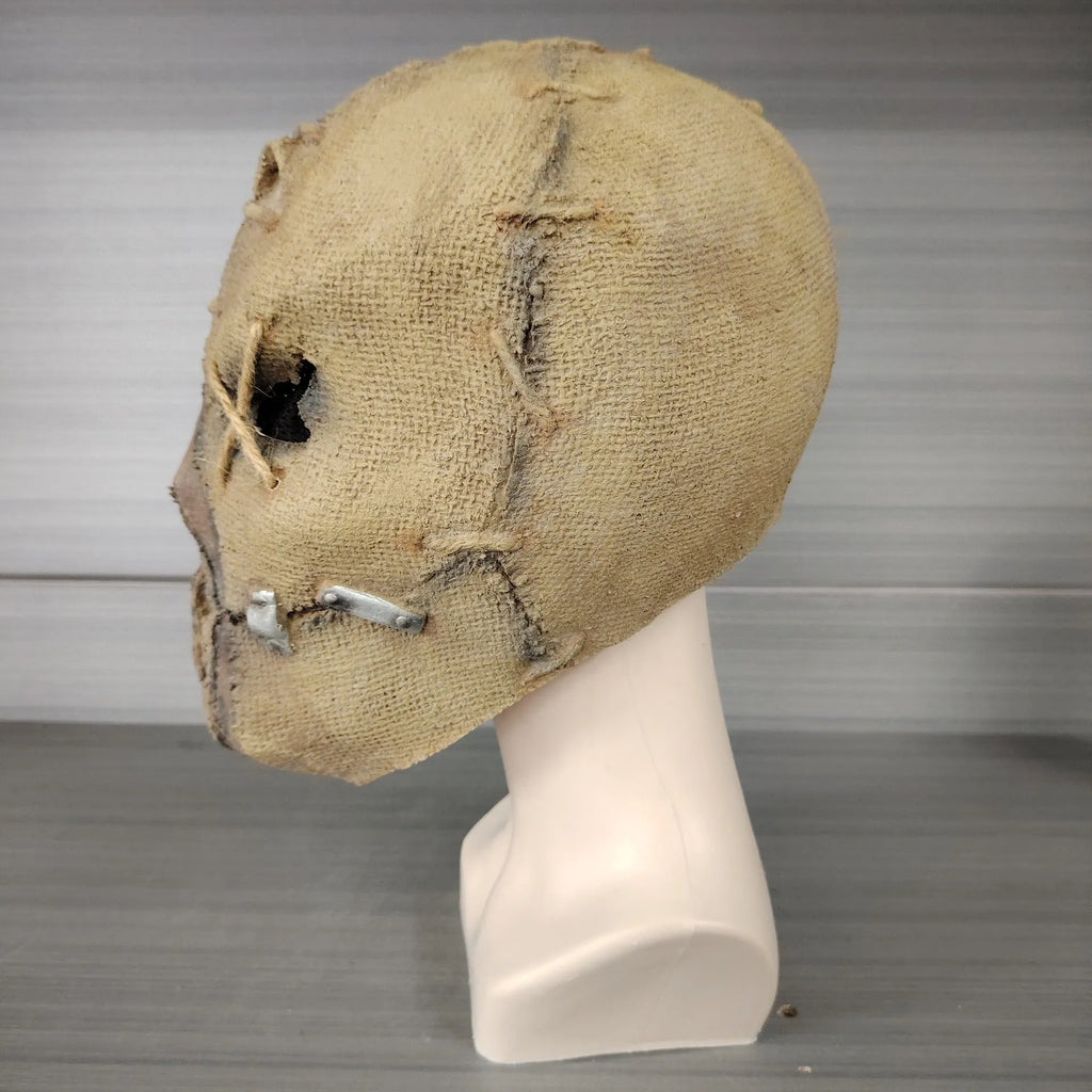 Scar skull design latex Halloween mask for adults measuring 31cm tall with horror styling
