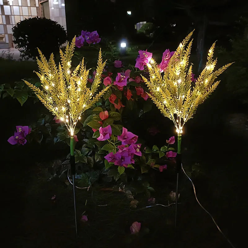 74cm tall solar-powered LED flower garden light in lavender colour options.