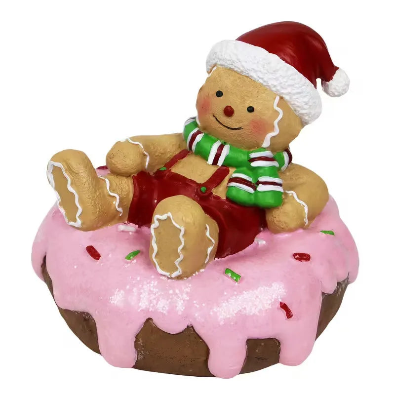 Hand drawn cartoon resin Christmas gingerbread man ornament with green bow design on white background