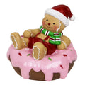 Hand drawn cartoon resin Christmas gingerbread man ornament with green bow design on white background