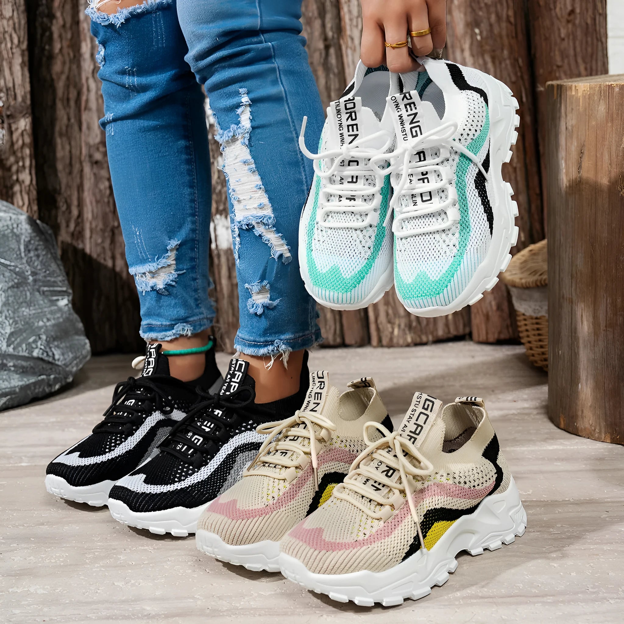 Women's lightweight casual sports shoe with mesh upper, PVC sole, and front lace-up in Black White colour