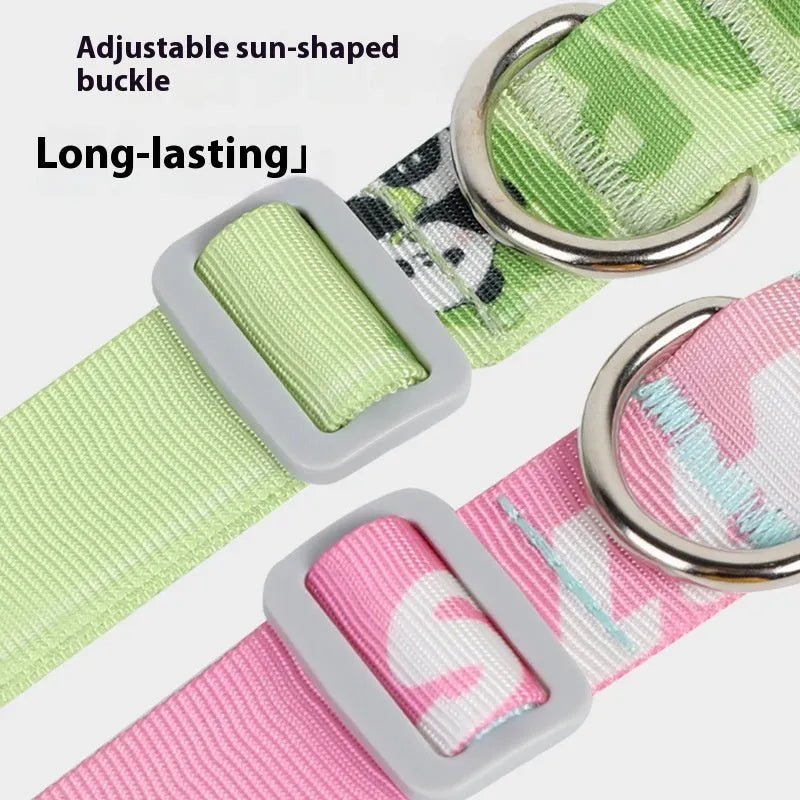 Adjustable nylon dog collar with colourful cartoon gradient print, shown in sizes for small to medium dogs.