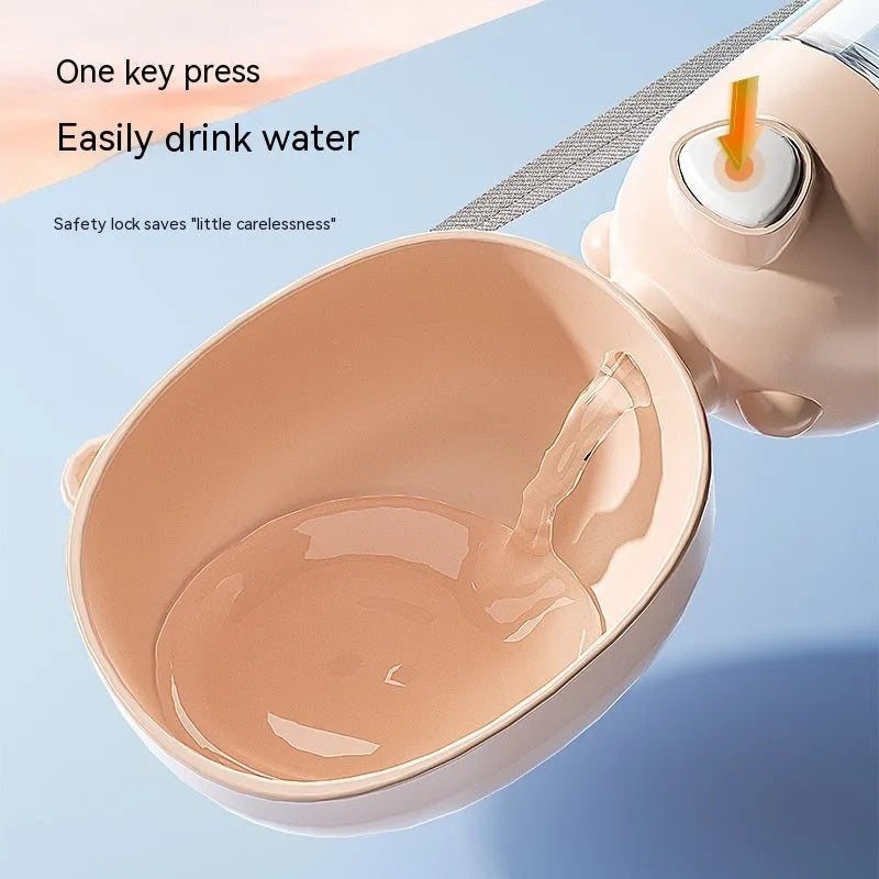 Yellow portable dog water bottle and feeder bowl for outdoor travel