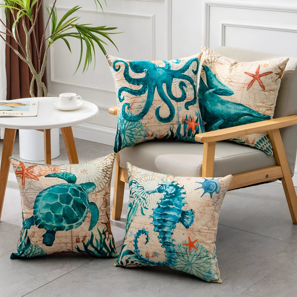 Square linen cushion cover with blue sea turtle print, showing invisible zipper closure.