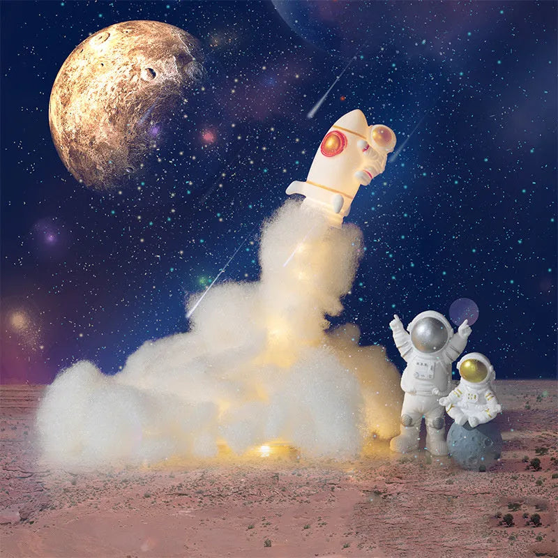 DIY astronaut rocket LED night light kit components including model, straws, chassis, and string lights for assembly
