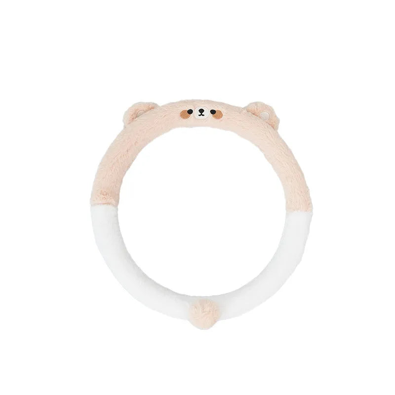 Plush rabbit fur car steering wheel cover with embroidered animal design, shown fitted on a 38cm wheel.