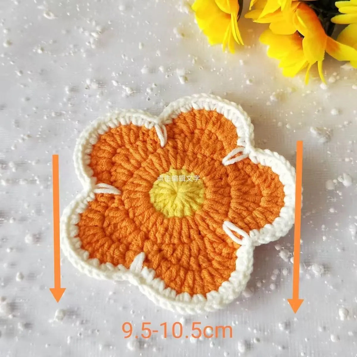 Set of five handmade woven cotton thread flower placemats in blue, green, orange, pink, and purple.