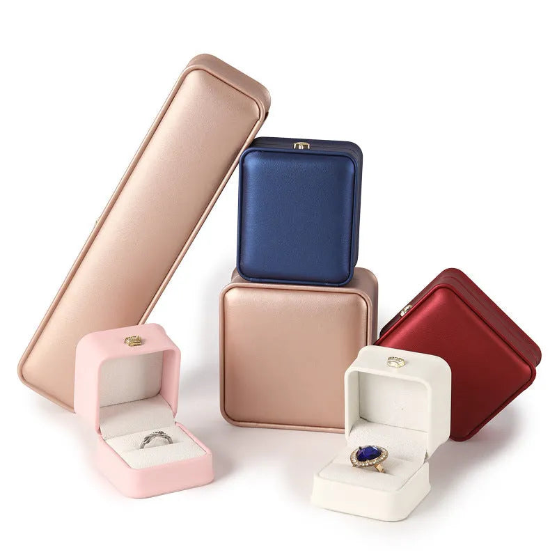 PU leather jewellery storage box in seven colours with ring, pendant, bracelet and necklace compartments