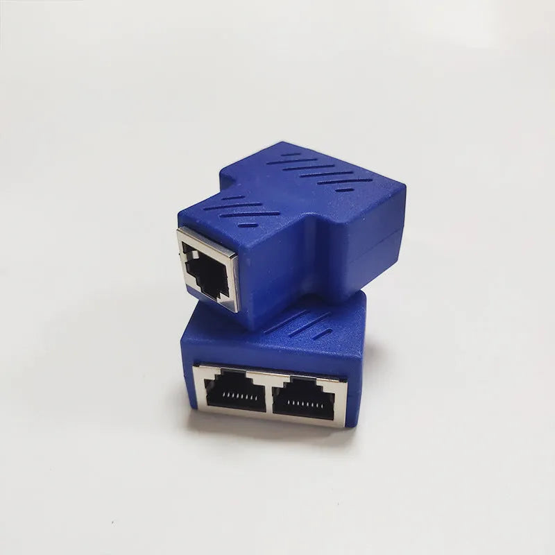 Two white RJ45 network splitter adapters for sharing one ethernet cable connection.