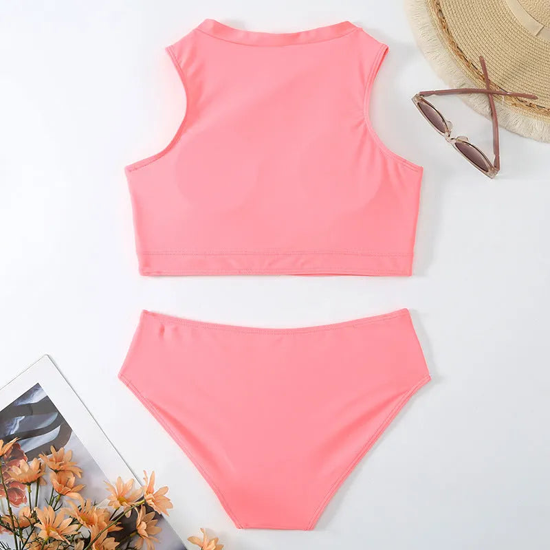 Pink high waisted bikini swimsuit with brief style and split cut design