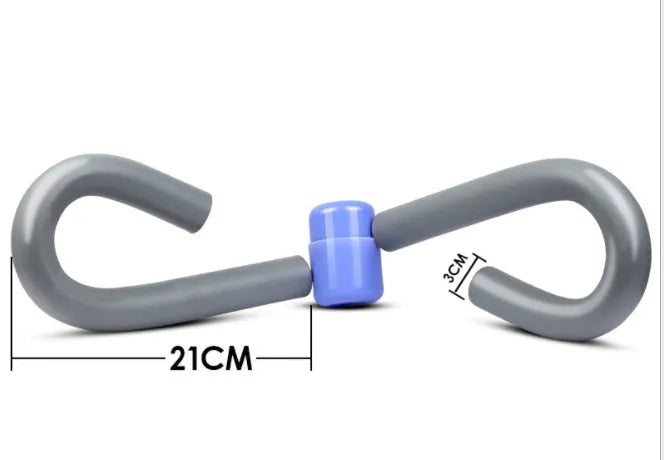 Pink PVC leg training clip with foam padding and steel spring for gym and home workouts.