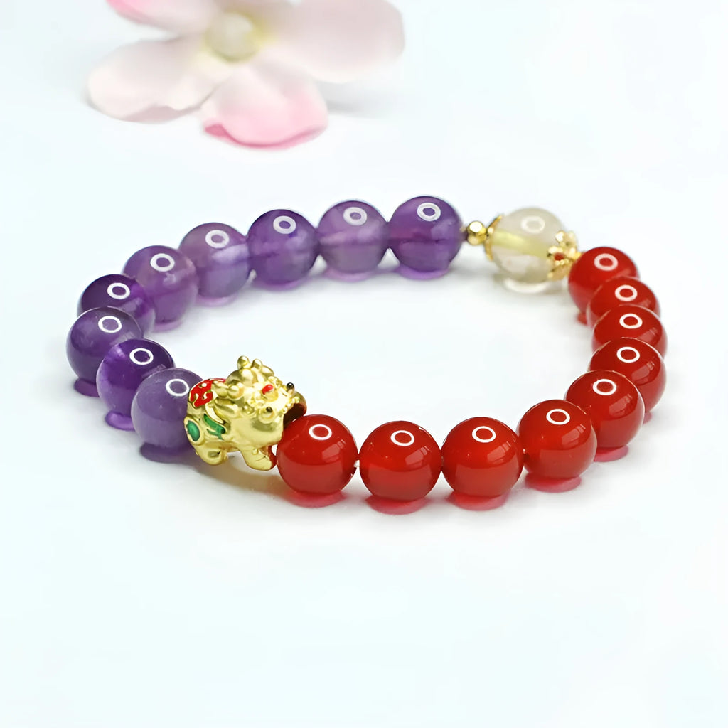 Close-up of an amethyst and red agate beaded bracelet in Chinese style with 8mm stone beads.