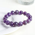 Natural feather Amethyst Snow Mountain purple crystal bracelet with geometric beads and Ruyi element.