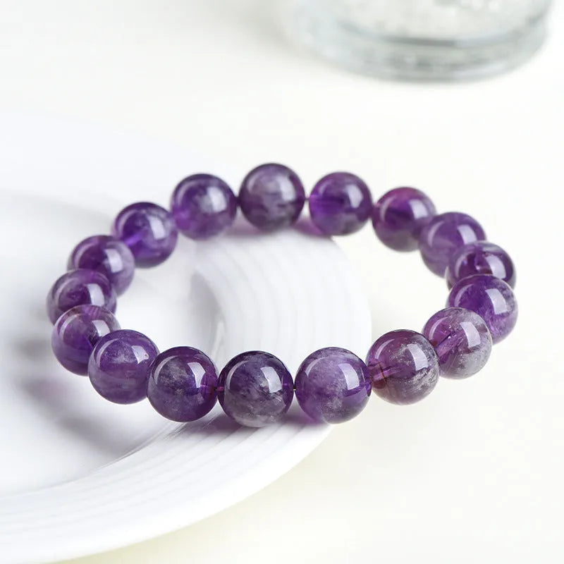 Natural feather Amethyst Snow Mountain purple crystal bracelet with geometric beads and Ruyi element.