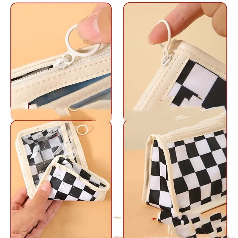 Large transparent PVC pencil case with chessboard grid pattern in black and white plaid.
