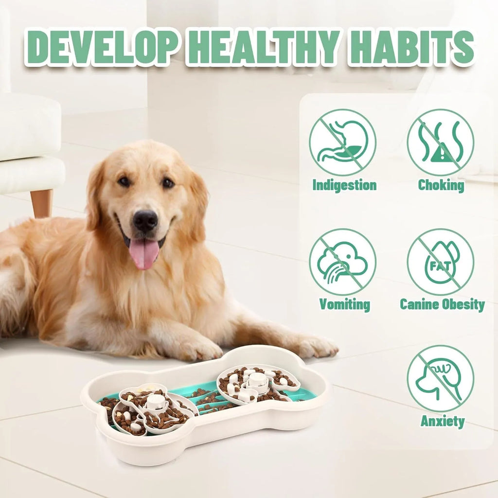 Large green slow feeder dog bowl with three-tiered puzzle trays and anti-slip suction cups on the base.