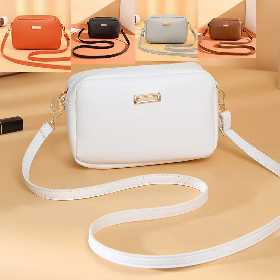 Solid colour PU ladies' shoulder bag in horizontal square shape with three-dimensional pocket.