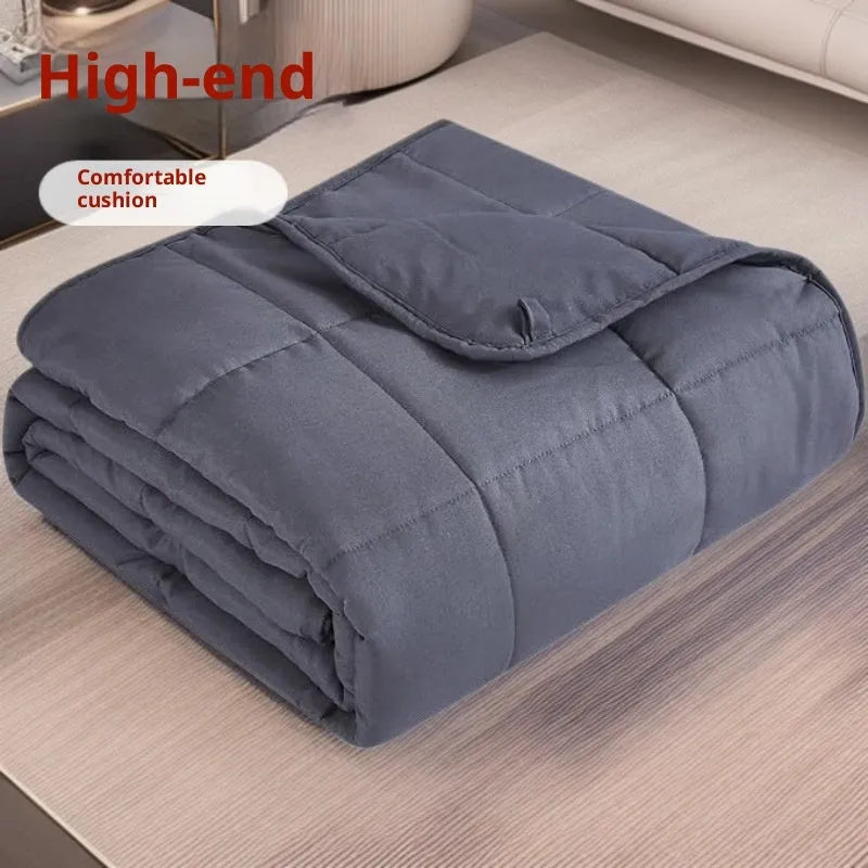Solid grey polyester weighted blanket 152x203cm on a sofa with European style