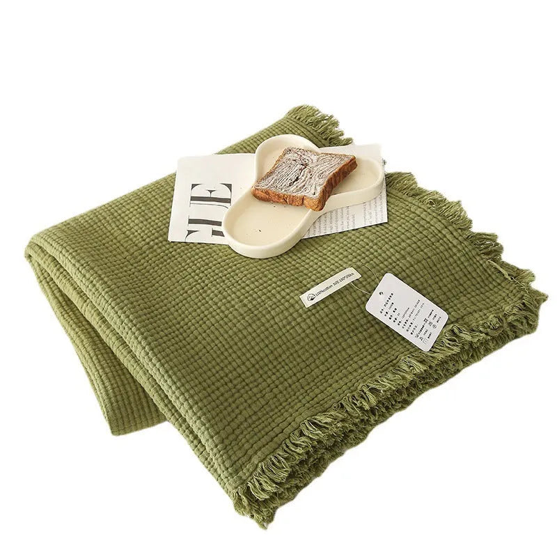 Four-layer gauze cotton blanket with tassel trim in an array of ten colours
