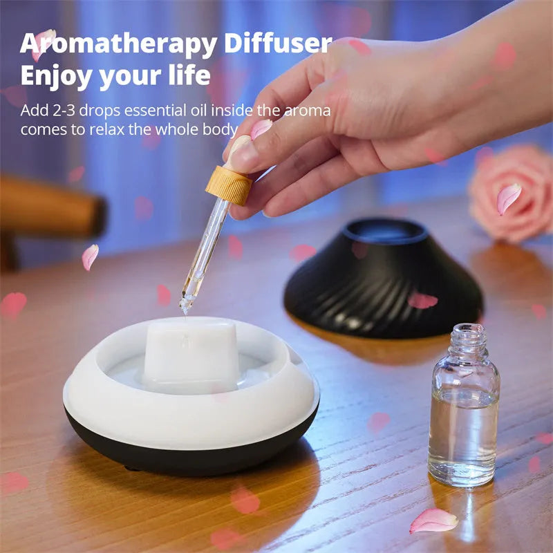 Beige USB aroma diffuser essential oil lamp with flame effect lighting on wooden surface