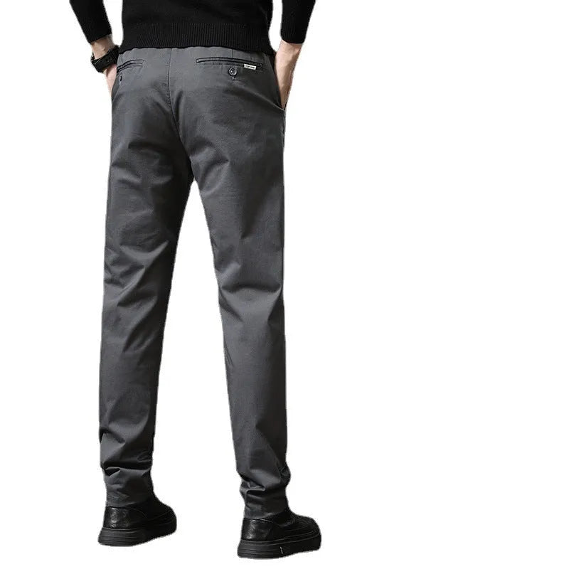 Men combed cotton light business casual trousers in black, side view showing mid-waist cut and fabric texture