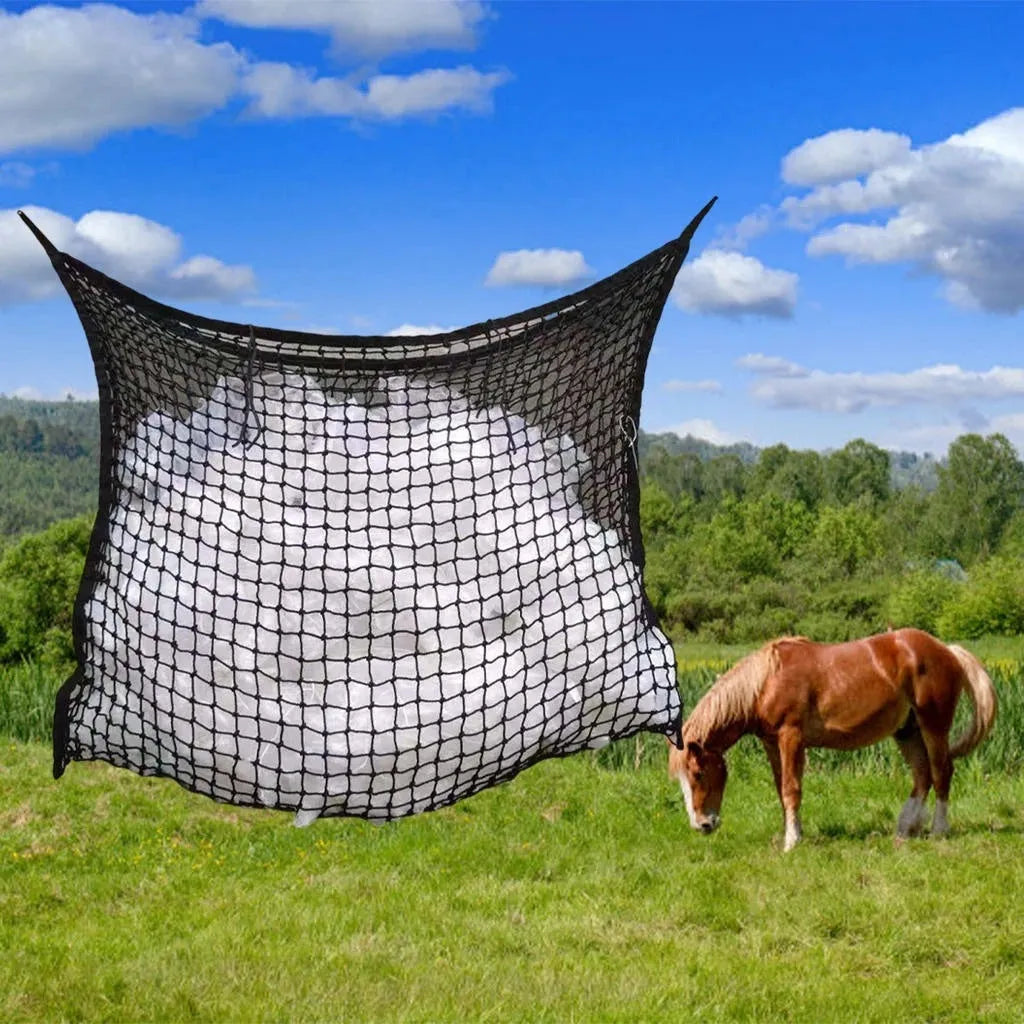 Black woven PE rope grid feeding bag hanging, sized for a horse.
