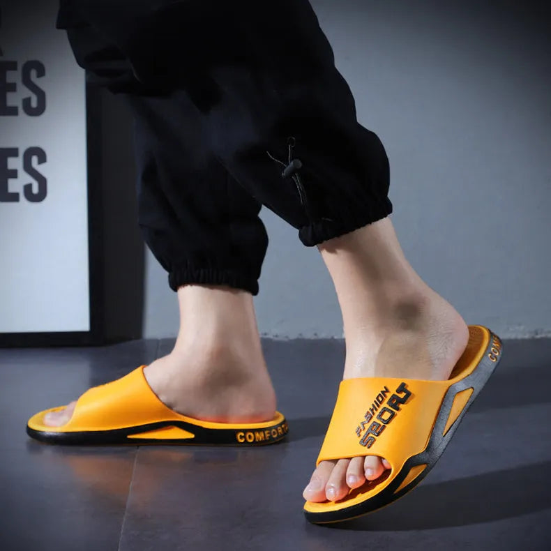 Unisex non-slip PVC beach bathroom slippers in black, open toe, youth trend style