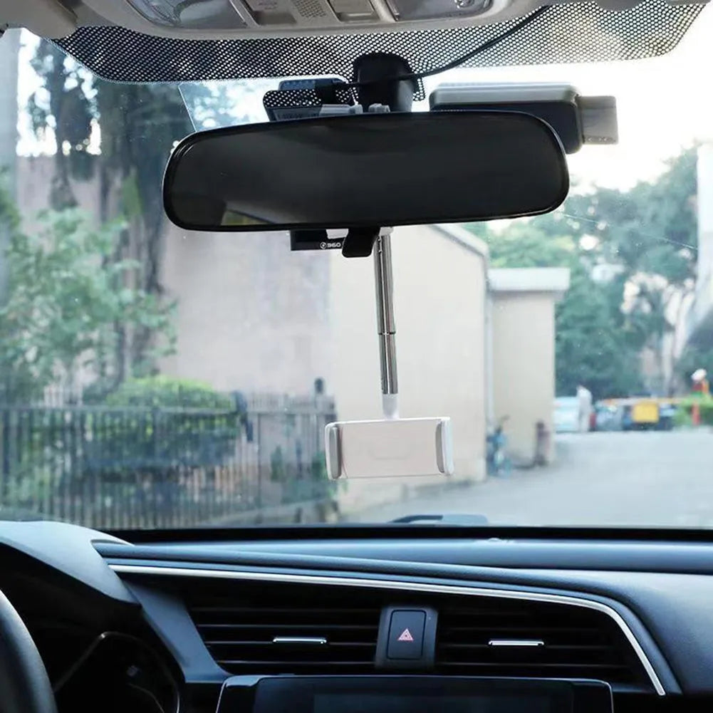 Black car rearview mirror phone holder showing 360-degree rotation joint and foam-padded phone cradle