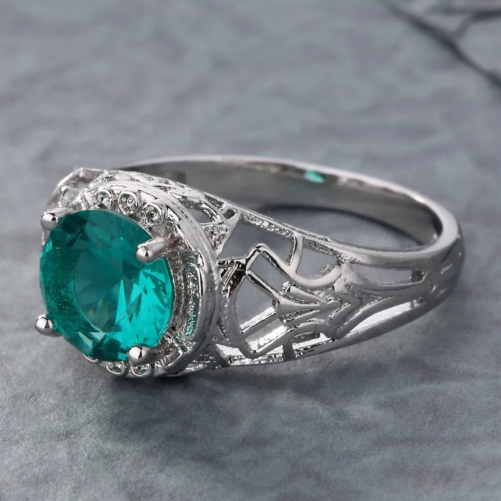 Silver-tone copper ring with inlaid zircon stone, unisex neutral band, sizes 6 to 10.