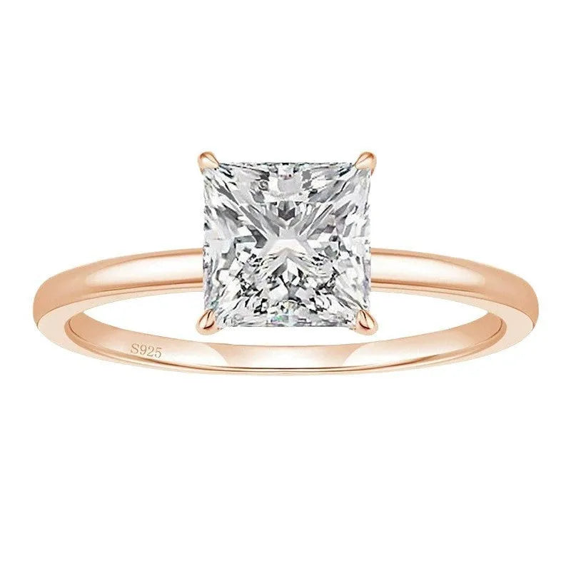 Sterling silver geometric women's ring with a round zirconia stone in silver, gold, or rose gold finish.