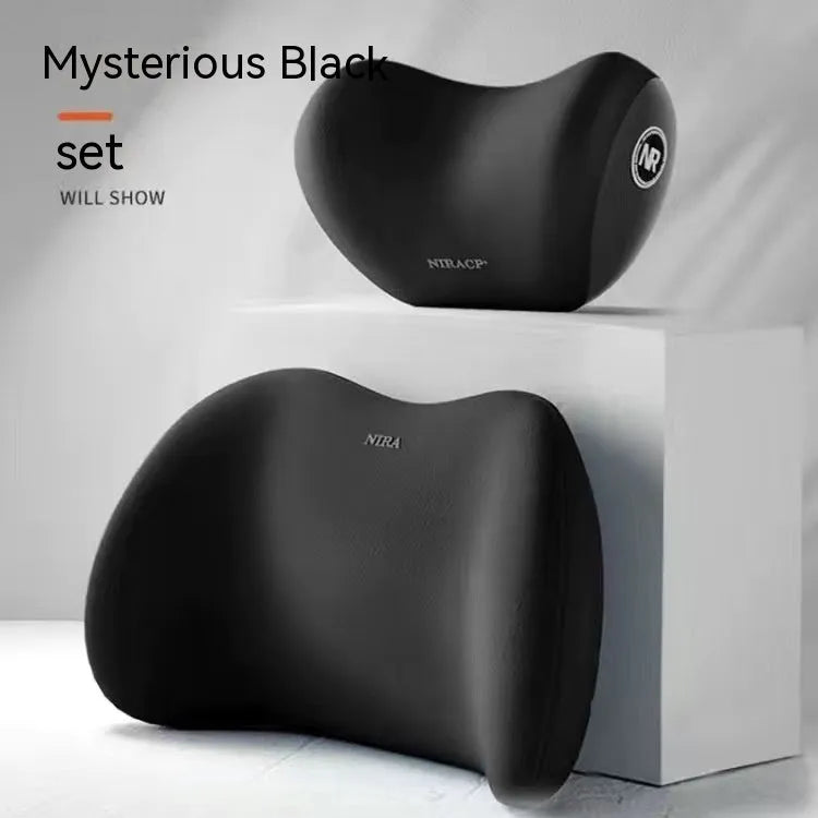 Black memory foam car headrest pillow and lumbar support pillow set on a car seat