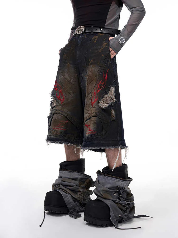 Men's retro denim jeans with detachable trouser legs in a wide-leg, loose fit