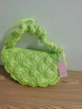 Women's nylon messenger bag in solid colour with adjustable shoulder strap, shown in beige