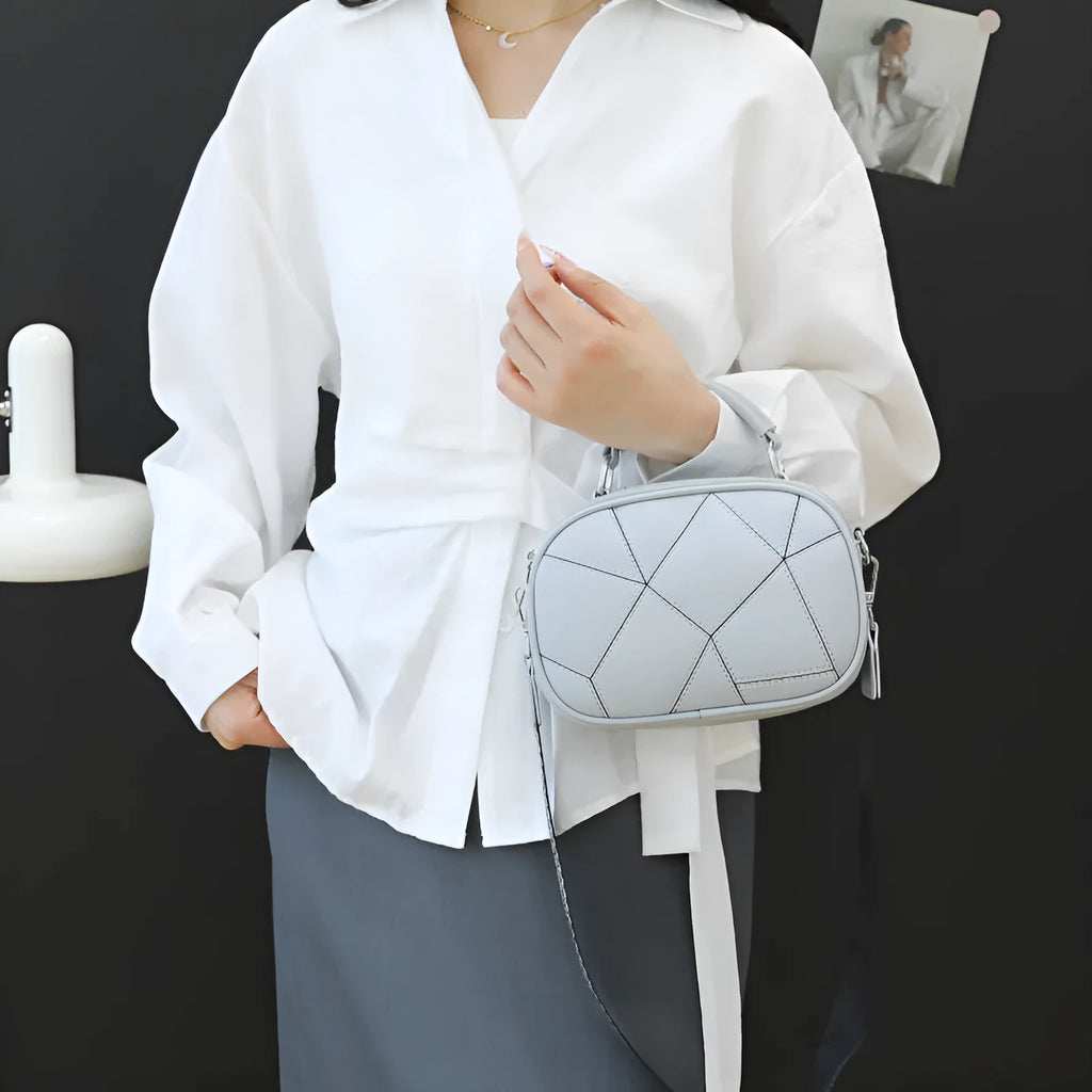 Three-layer patchwork small bag in round suitcase shape measuring 20x15 cm