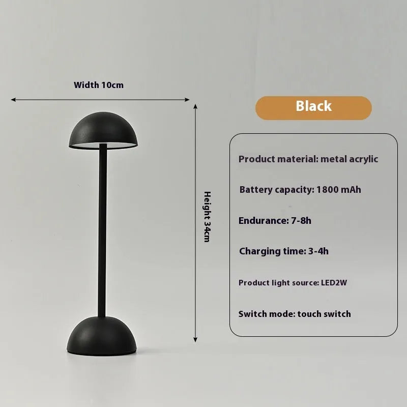 Metal mushroom table lamp in high foot design with white finish on a bar table