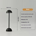 Metal mushroom table lamp in high foot design with white finish on a bar table