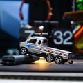 1:64 alloy Bluetooth drift remote control car with three-speed regulation on a smooth tabletop