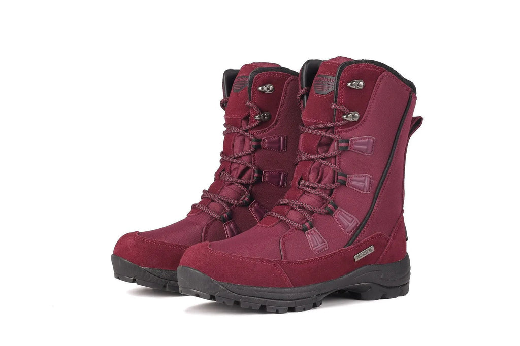 Women's black mid-calf snow boots with a round toe and genuine leather upper on a rubber sole.