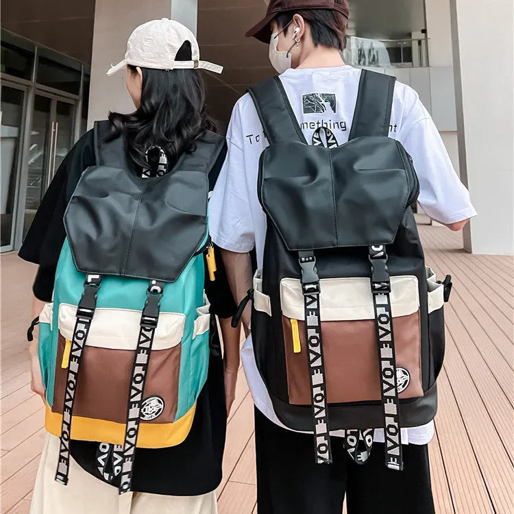 Colour matching Oxford cloth backpack shown in black, green, and red colour options