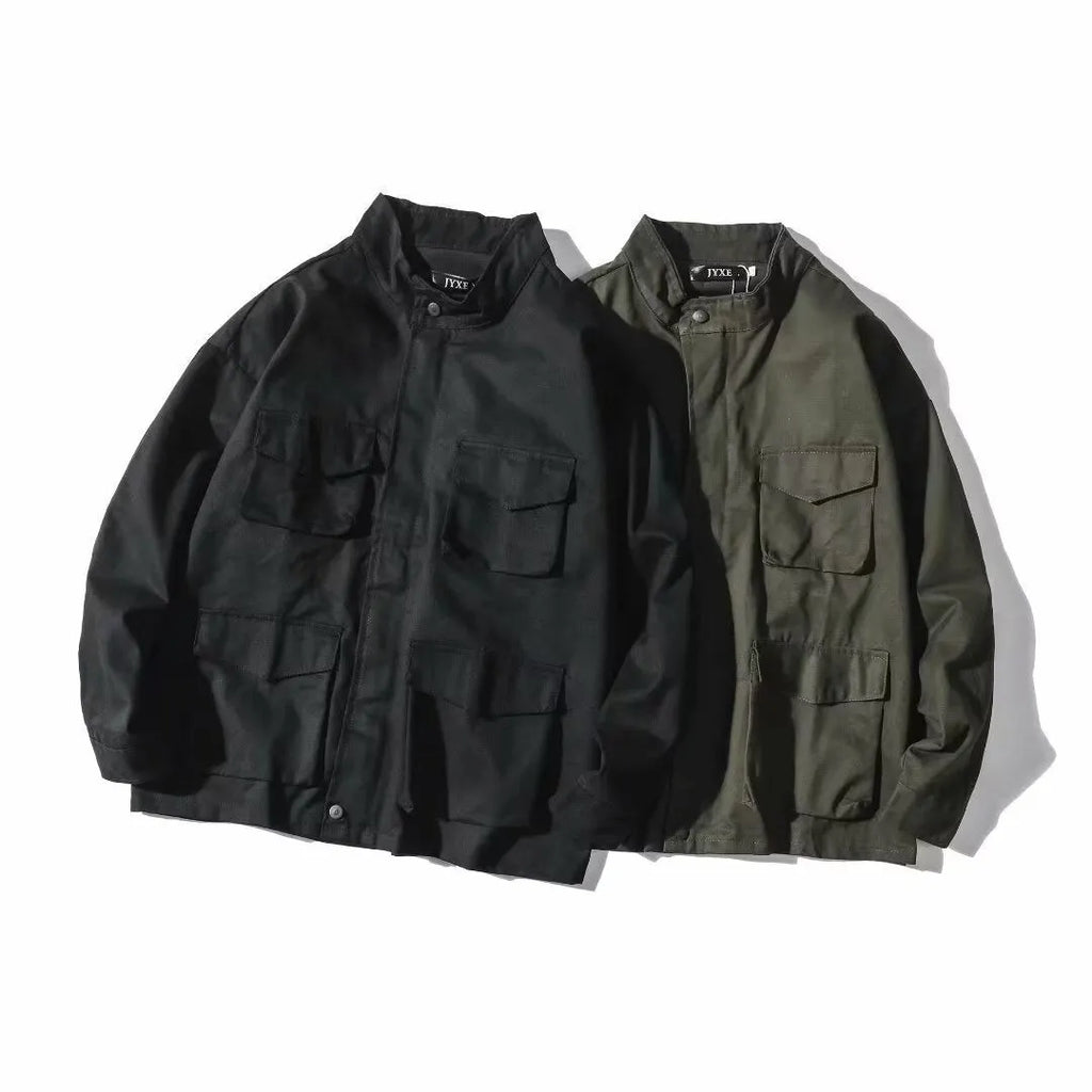 Men's multi-pocket workwear jacket in black or green, loose fit, long sleeve, sizes M to 3XL