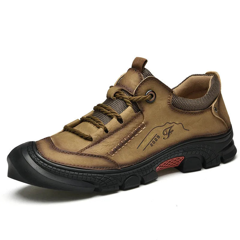 Non-slip wear-resistant hiking boots in black with leather upper and rubber sole for outdoor cross-country use